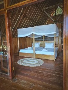 Deluxe Eco Over Water Bungalow - Katembe Private Island Raja Ampat